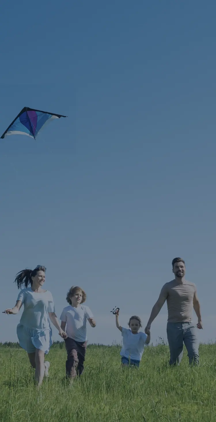 family playing in field